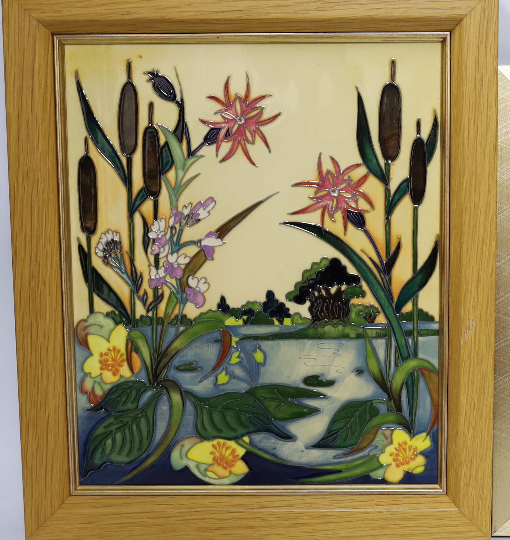 A Moorcroft Rachel Bishop wall plaque of bulrushes, another similar plaque and a signed print by Paul Hilditch, ‘A Vision of Windsor’, largest overall 60cm x 48cm